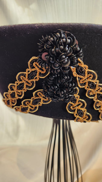 Black Felted wool Hat with peaked brim and gold ribbon embellishment