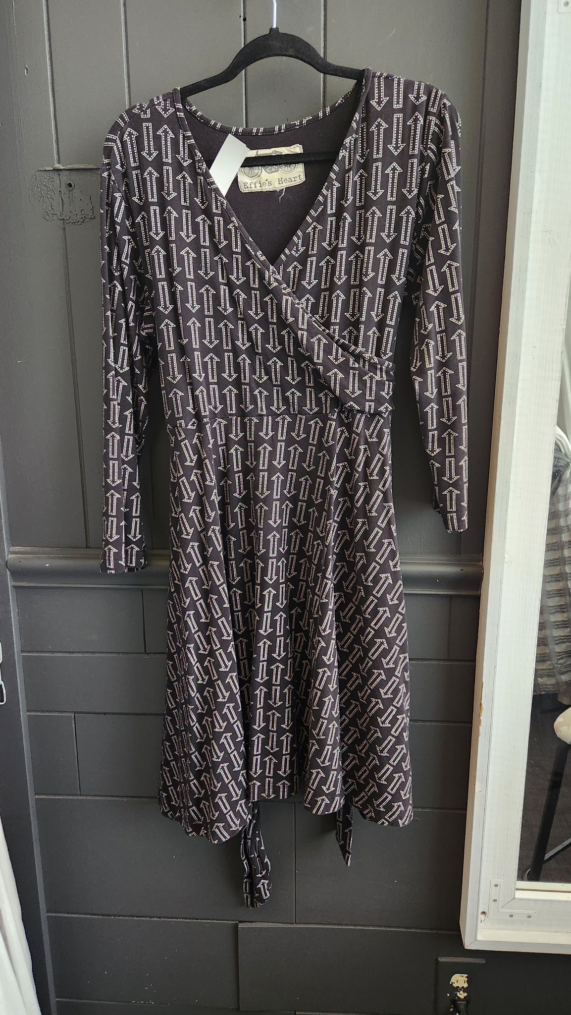 Effie's Heart Long Sleeve Faux Wrap Black Dress with Arrow Motif