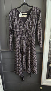 Effie's Heart Long Sleeve Faux Wrap Black Dress with Arrow Motif