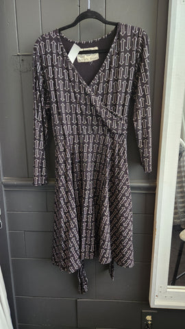 Effie's Heart Long Sleeve Faux Wrap Black Dress with Arrow Motif