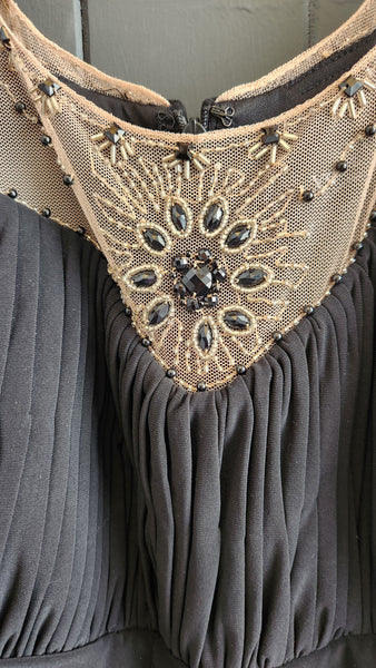 Xscape Sleeveless Sheer and Beaded Black Long Gown