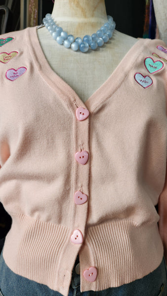 Voodoo Vixen Cropped Pink Sweetheart Sweater with heart buttons