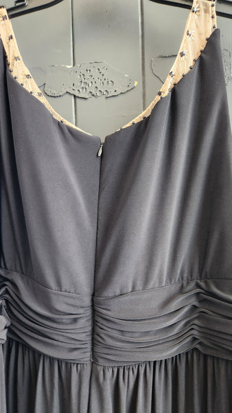 Xscape Sleeveless Sheer and Beaded Black Long Gown